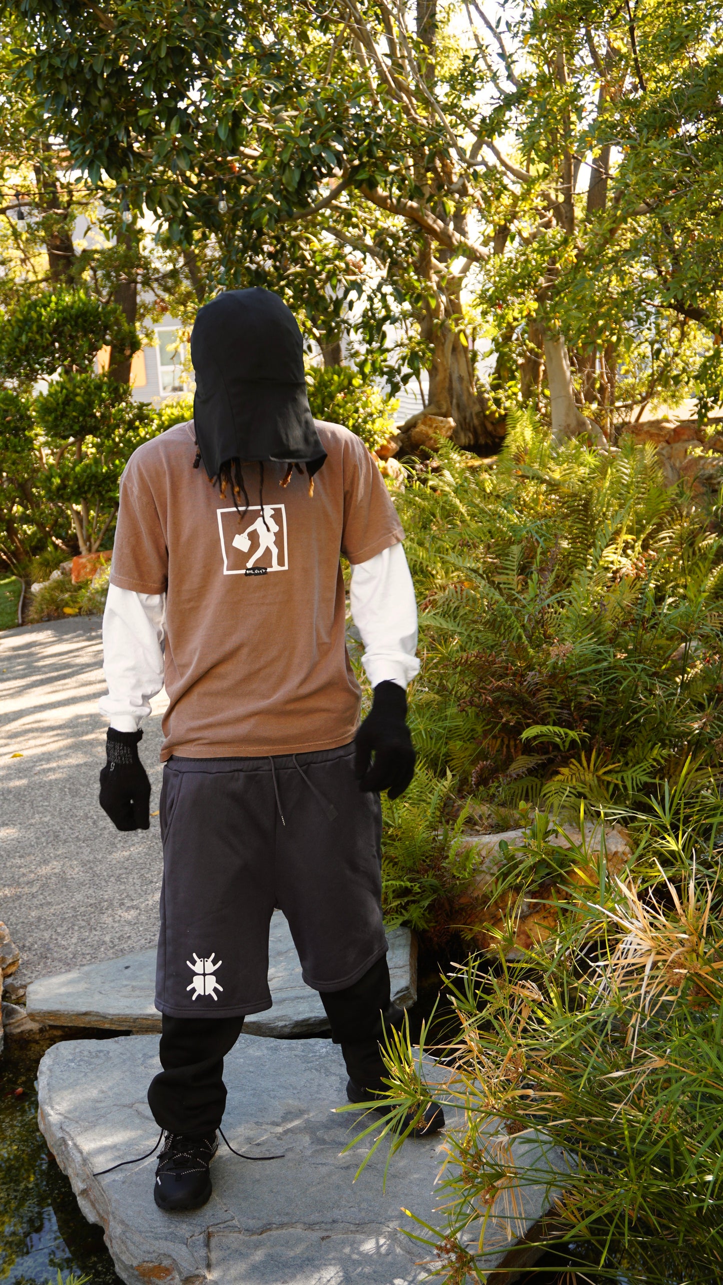 SUITCASE BROWN TSHIRT - Bailout Grounds